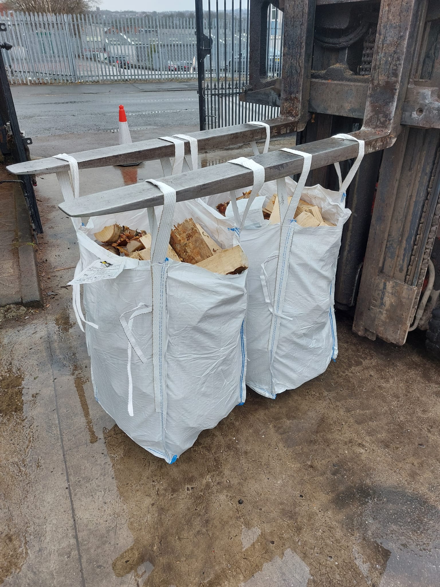 this is a photo of 'barrow bags of firewood'